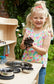 playing with mud kitchen